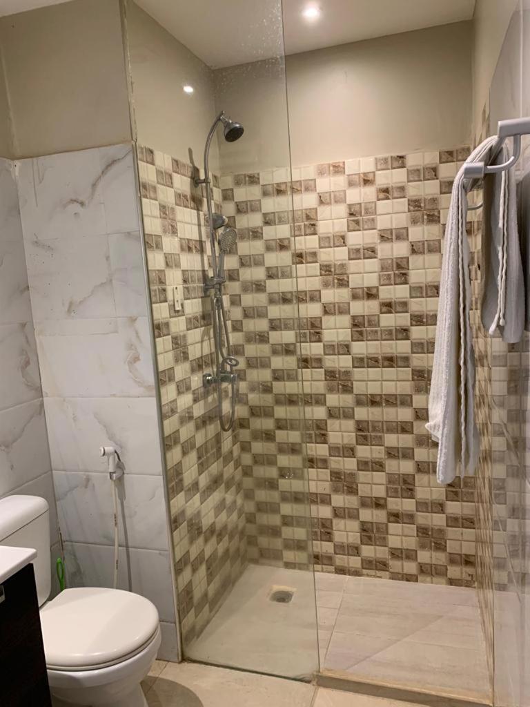 Appartement A Residence De La Paix Дакар Экстерьер фото